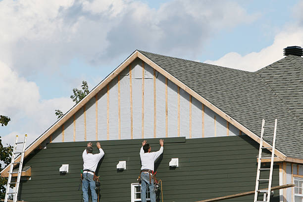 Professional Siding Contractor technician working in Wesley Chapel, NC